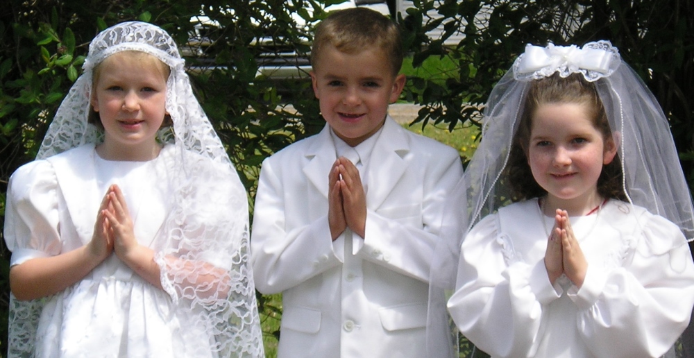 Children's Catholic Catechism - The Communion and Confirmation Baltimore Catechism for children and adults. Roman Catholic Catechism Children in First Communion Dresses and Suits.