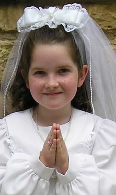 First Communion Girl With White Veil