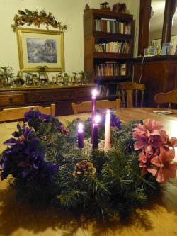 Fourth Sunday Of Advent - Light three purple candles and one rose candle.