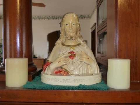 Sacred Heart of Jesus Statue Sick Call Set. The compartment in back holds candles, Crucifix, Holy Water, Prayers for the Dying, and more.